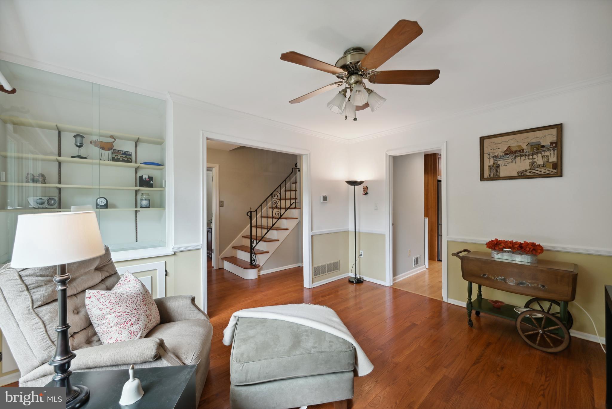 16 Fieldston Road West Windsor, NJ 08550 - Photo 7 of 34 a living room with furniture and a chandelier
