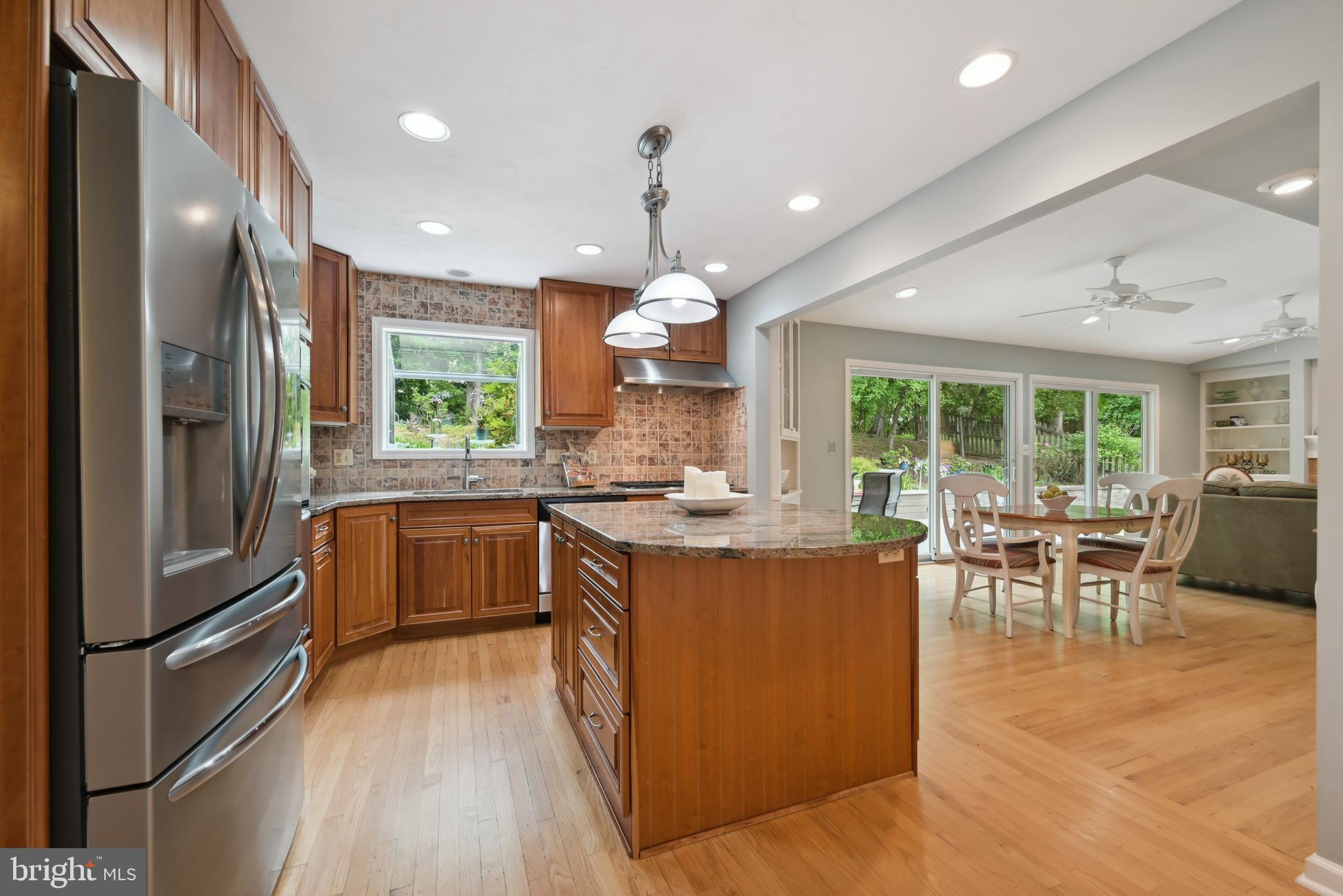 16 Fieldston Road West Windsor, NJ 08550 - Photo 10 of 34 a kitchen with stainless steel appliances granite countertop a stove and a refrigerator