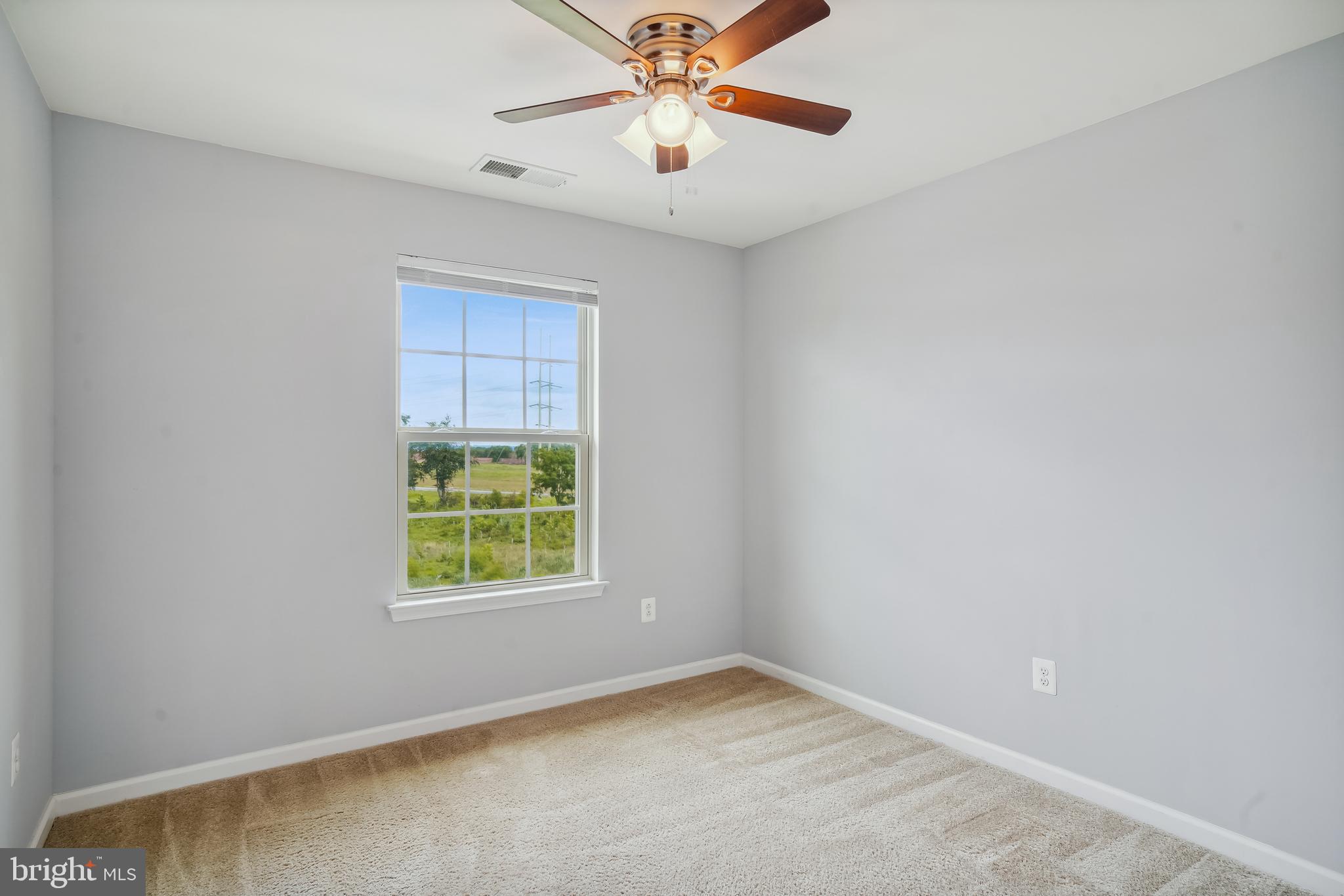 5934 Jefferson Commons Way Frederick, MD 21703 - Photo 17 of 27 an empty room with windows and fan