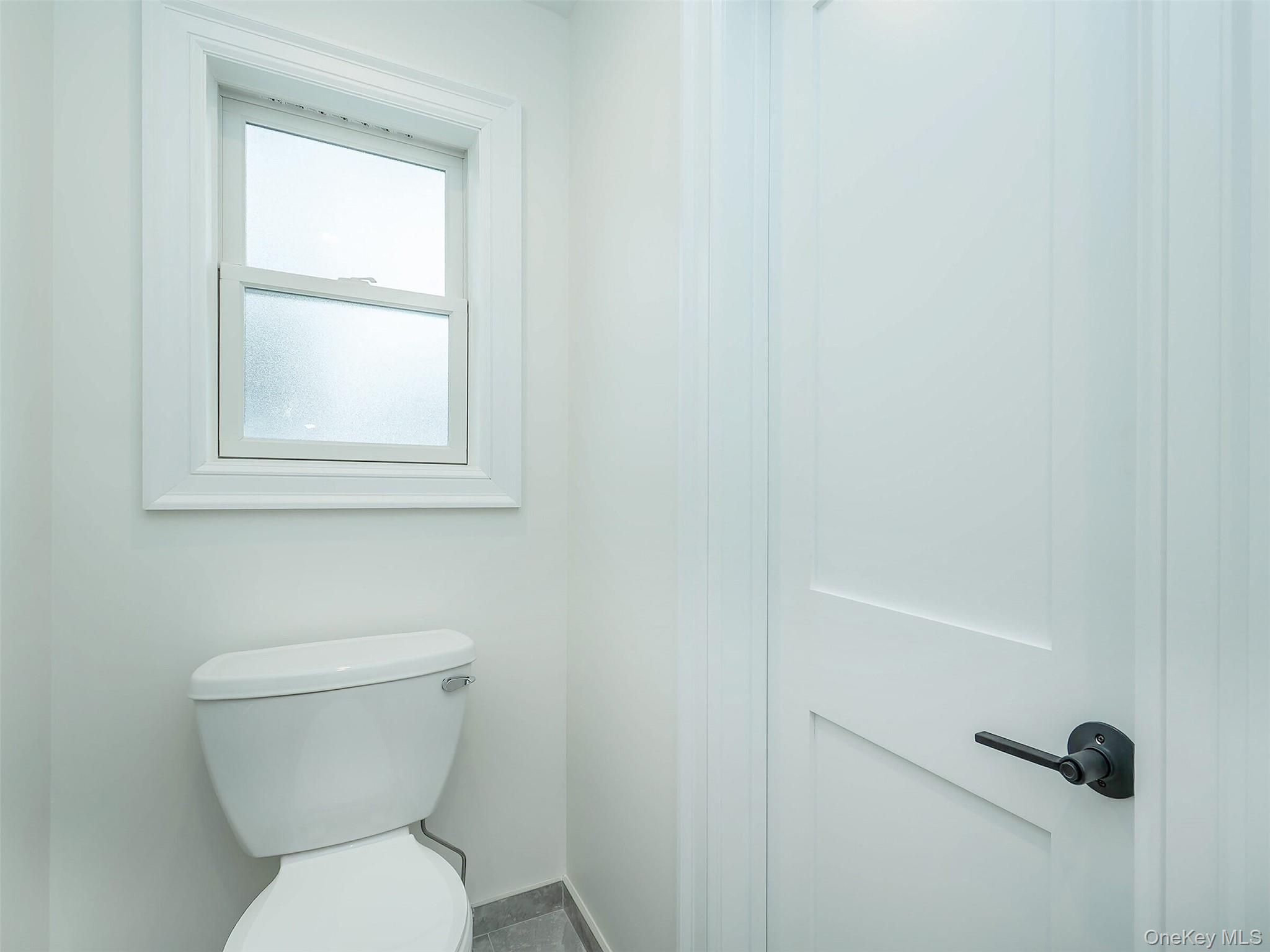 35 B Dunwood Road Port Washington, NY 11050 - Photo 12 of 35 a bathroom with a toilet