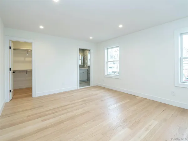 a view of an empty walk in closet