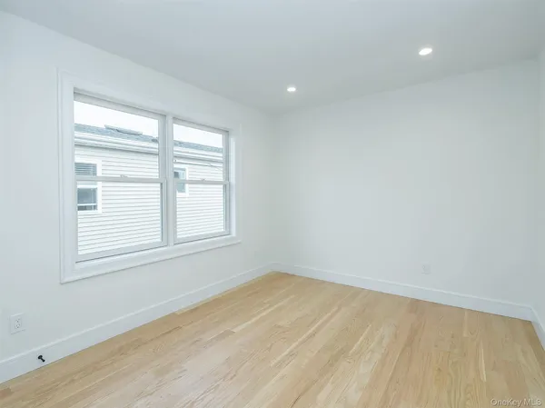 a bathroom with a double vanity sink toilet and shower