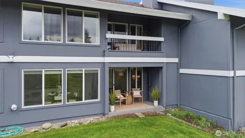 a front view of a house with parking space