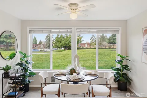 a dining room with furniture mountain view and a garden
