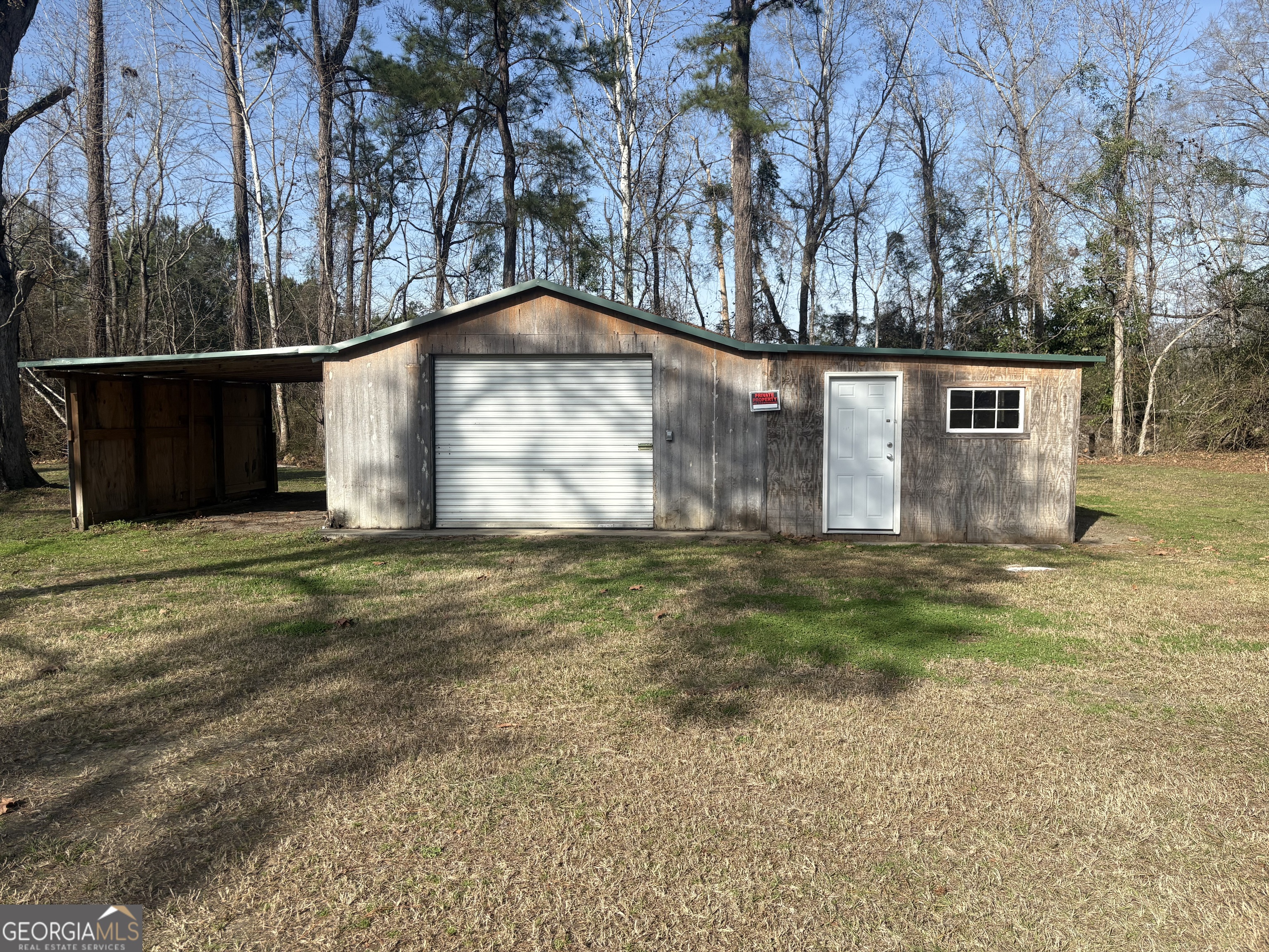 174 Main Street Rocky Ford, GA 30455 - Photo 7 of 8 a view of a backyard