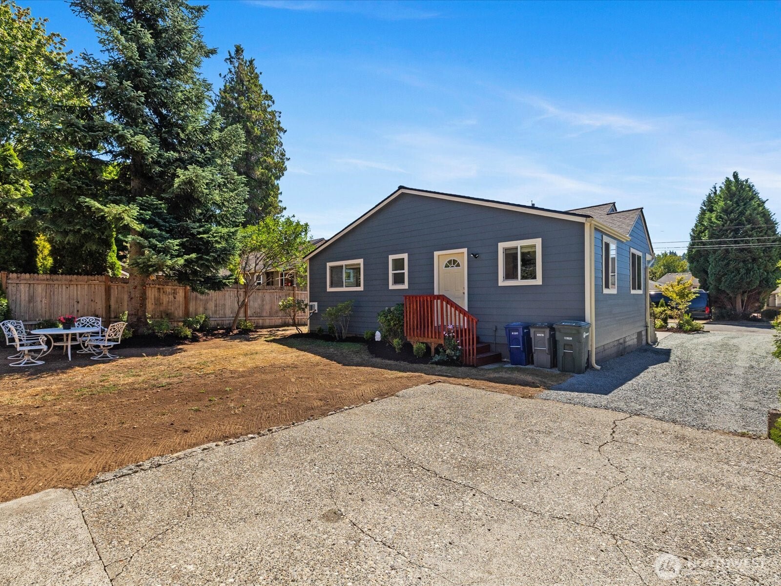 10126 Northeast 186th Street Bothell, WA 98011 - Photo 11 of 40 a front view of a house with a yard and garage