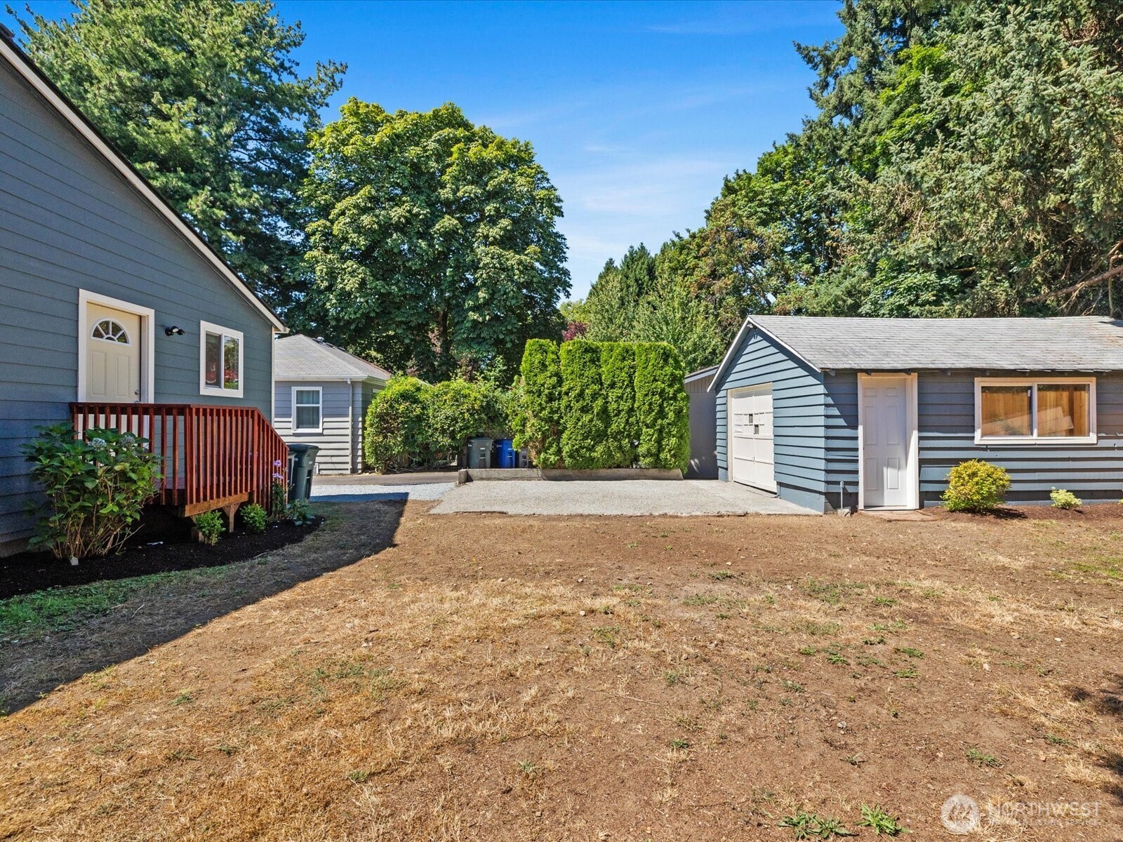 10126 Northeast 186th Street Bothell, WA 98011 - Photo 13 of 40 a view of a house with backyard and garden