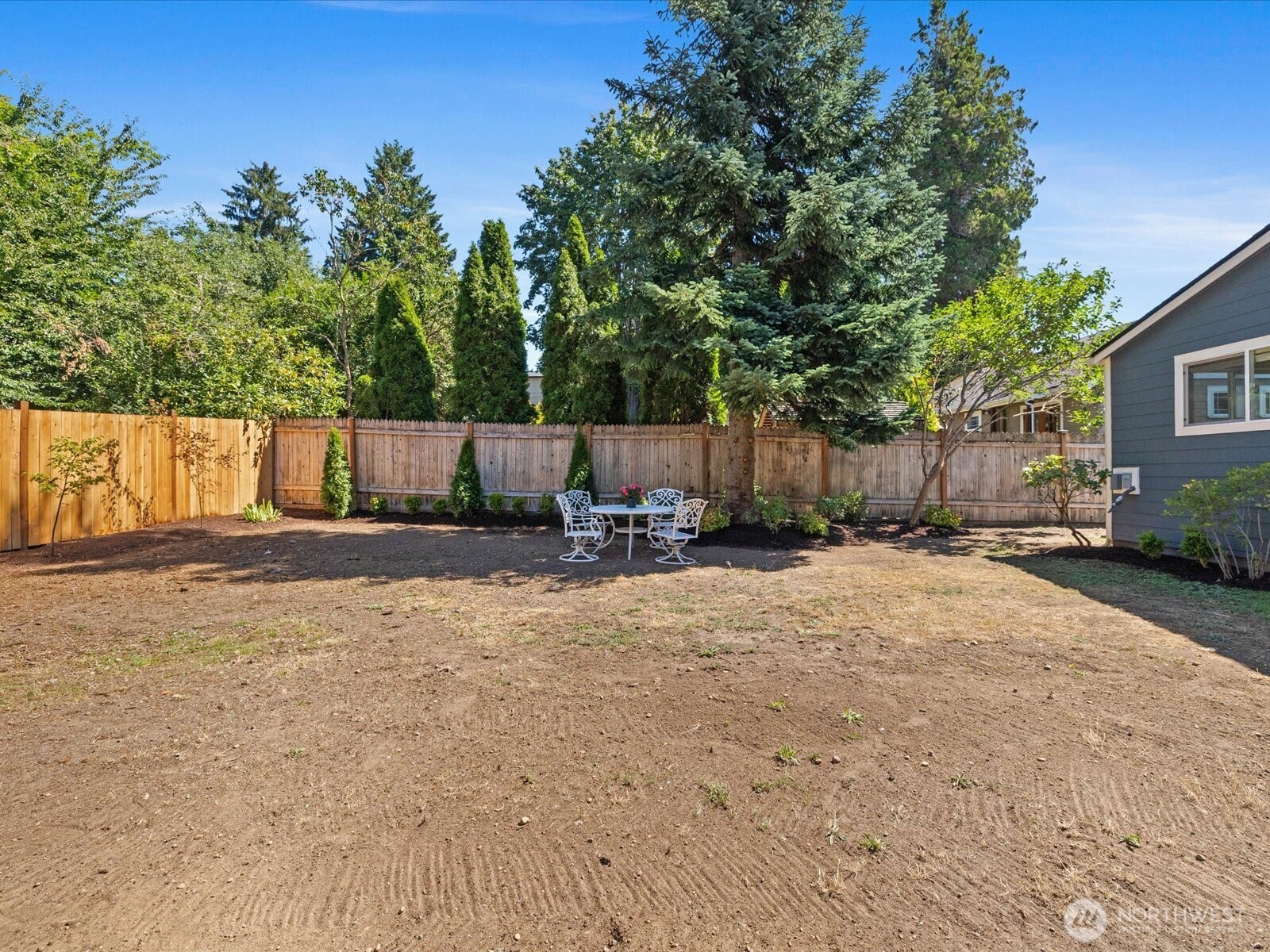 10126 Northeast 186th Street Bothell, WA 98011 - Photo 15 of 40 a view of a backyard of the house
