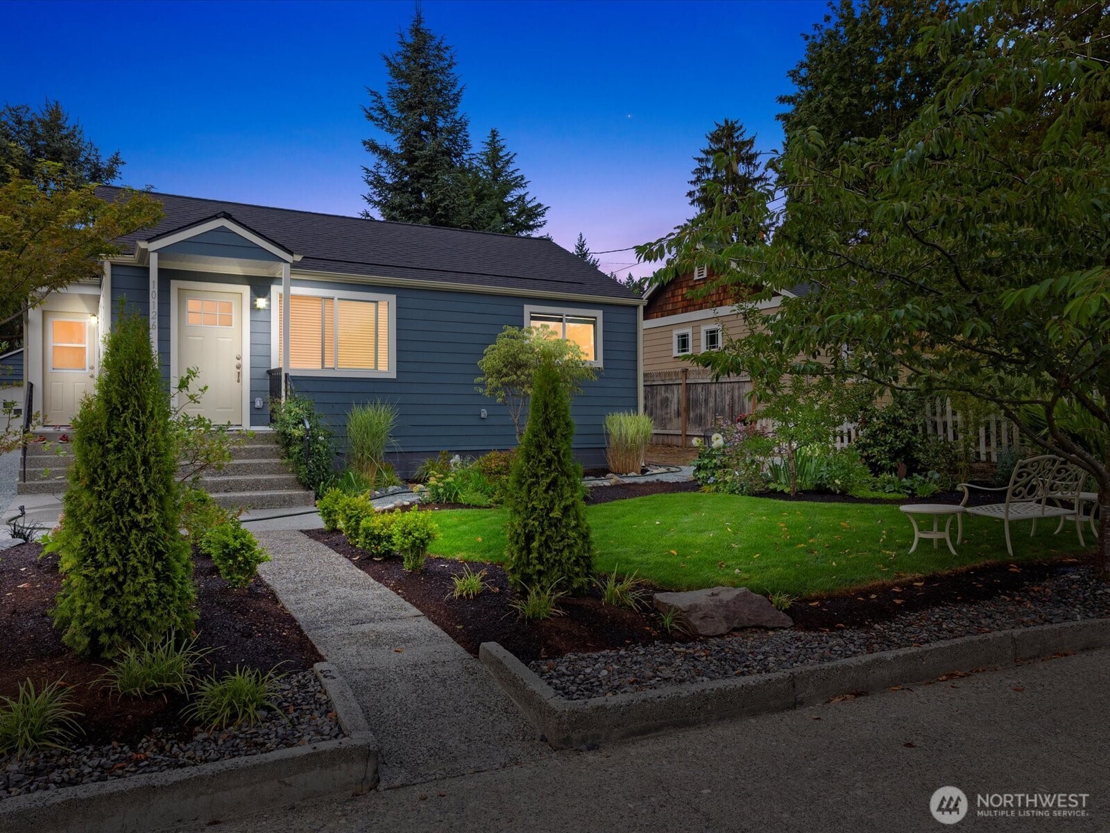 10126 Northeast 186th Street Bothell, WA 98011 - Photo 17 of 40 a front view of a house with garden