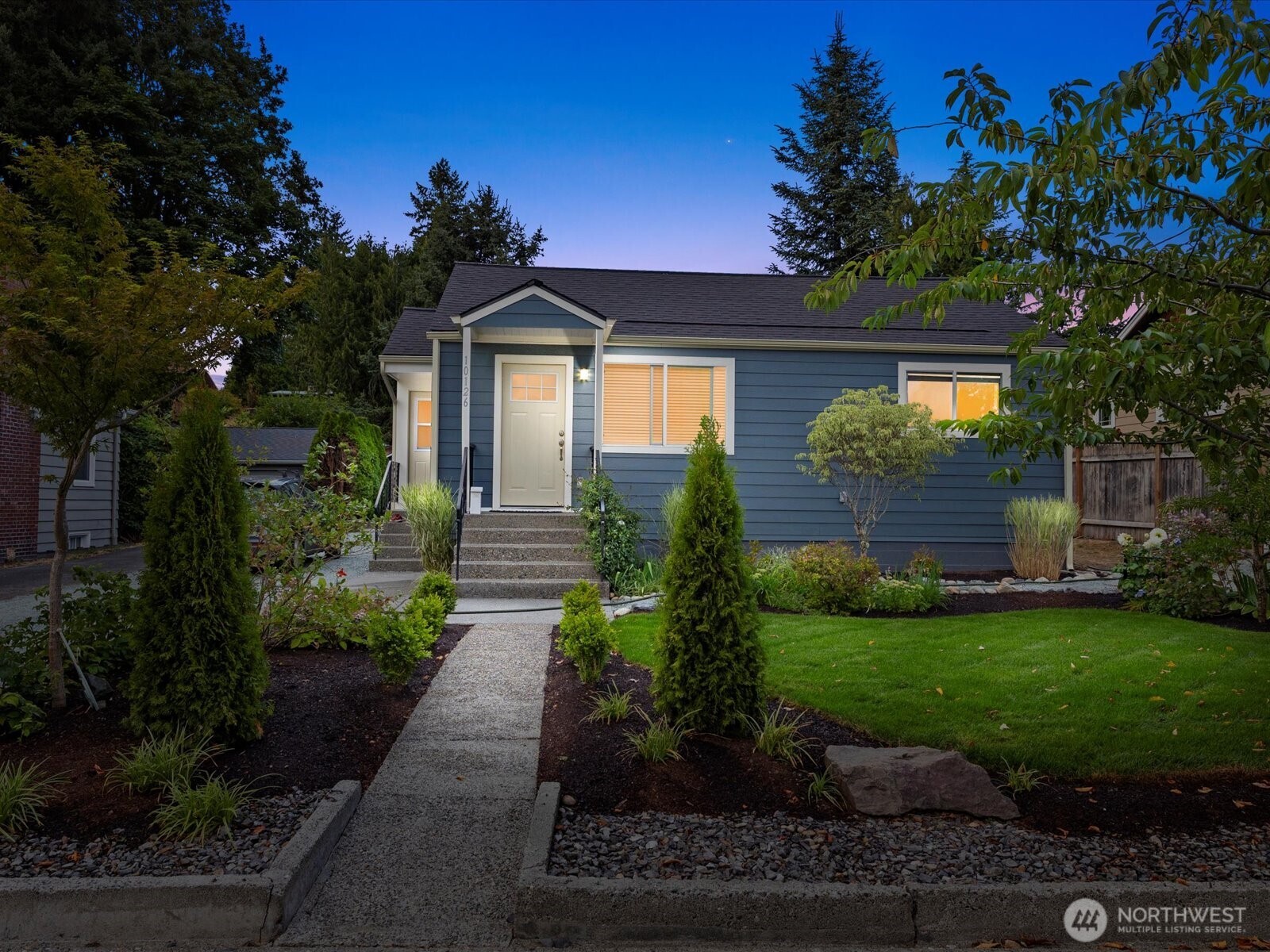 10126 Northeast 186th Street Bothell, WA 98011 - Photo 19 of 40 a front view of a house with a yard