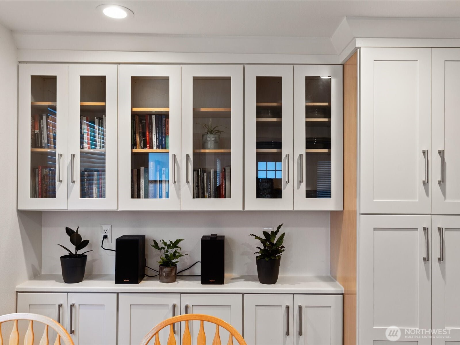 10126 Northeast 186th Street Bothell, WA 98011 - Photo 26 of 40 a kitchen with stainless steel appliances white cabinets and a window