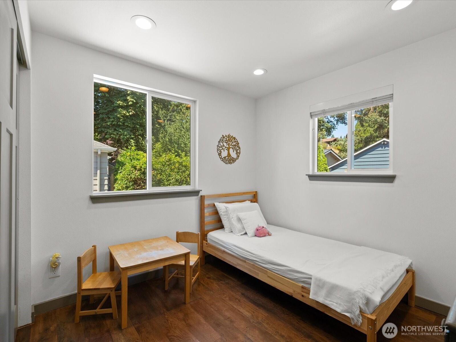 10126 Northeast 186th Street Bothell, WA 98011 - Photo 32 of 40 a bedroom with a bed and a window
