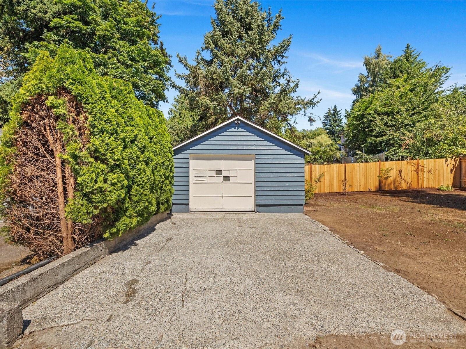 10126 Northeast 186th Street Bothell, WA 98011 - Photo 10 of 40 a front view of a house with a yard and garage