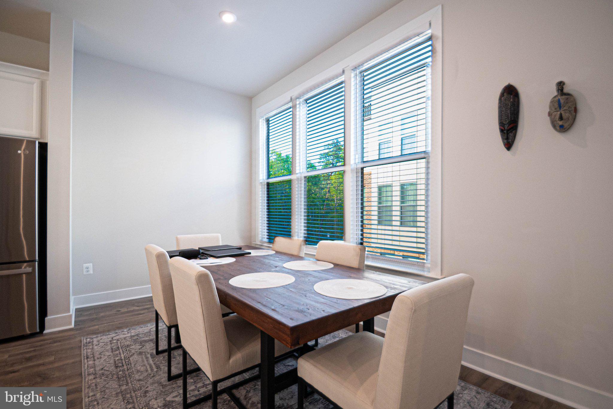 2453 Liberty Loop Herndon, VA 20171 - Photo 25 of 52 a view of a dining room with furniture window and outside view