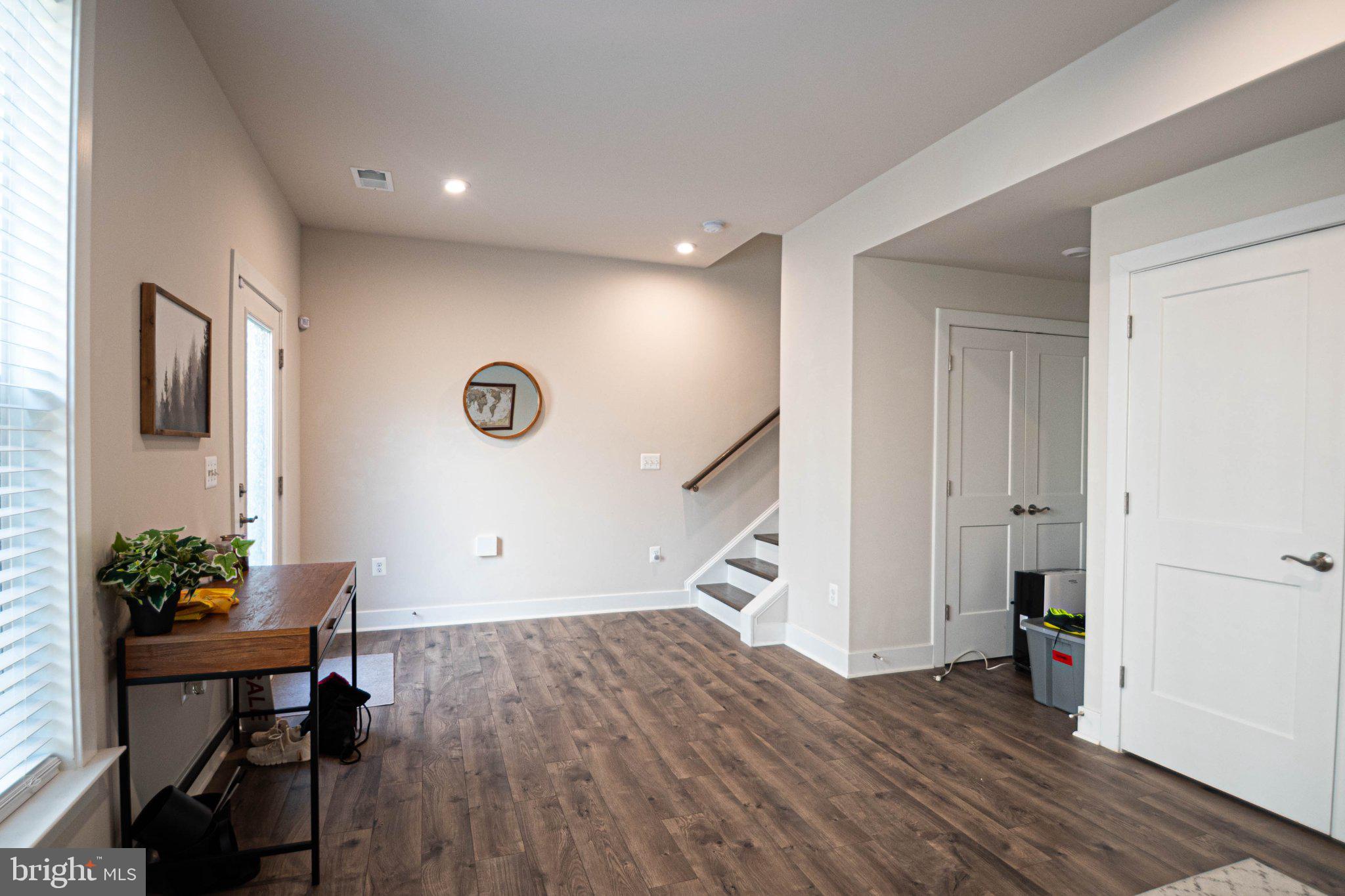 2453 Liberty Loop Herndon, VA 20171 - Photo 3 of 52 a view of livingroom with furniture and wooden floor