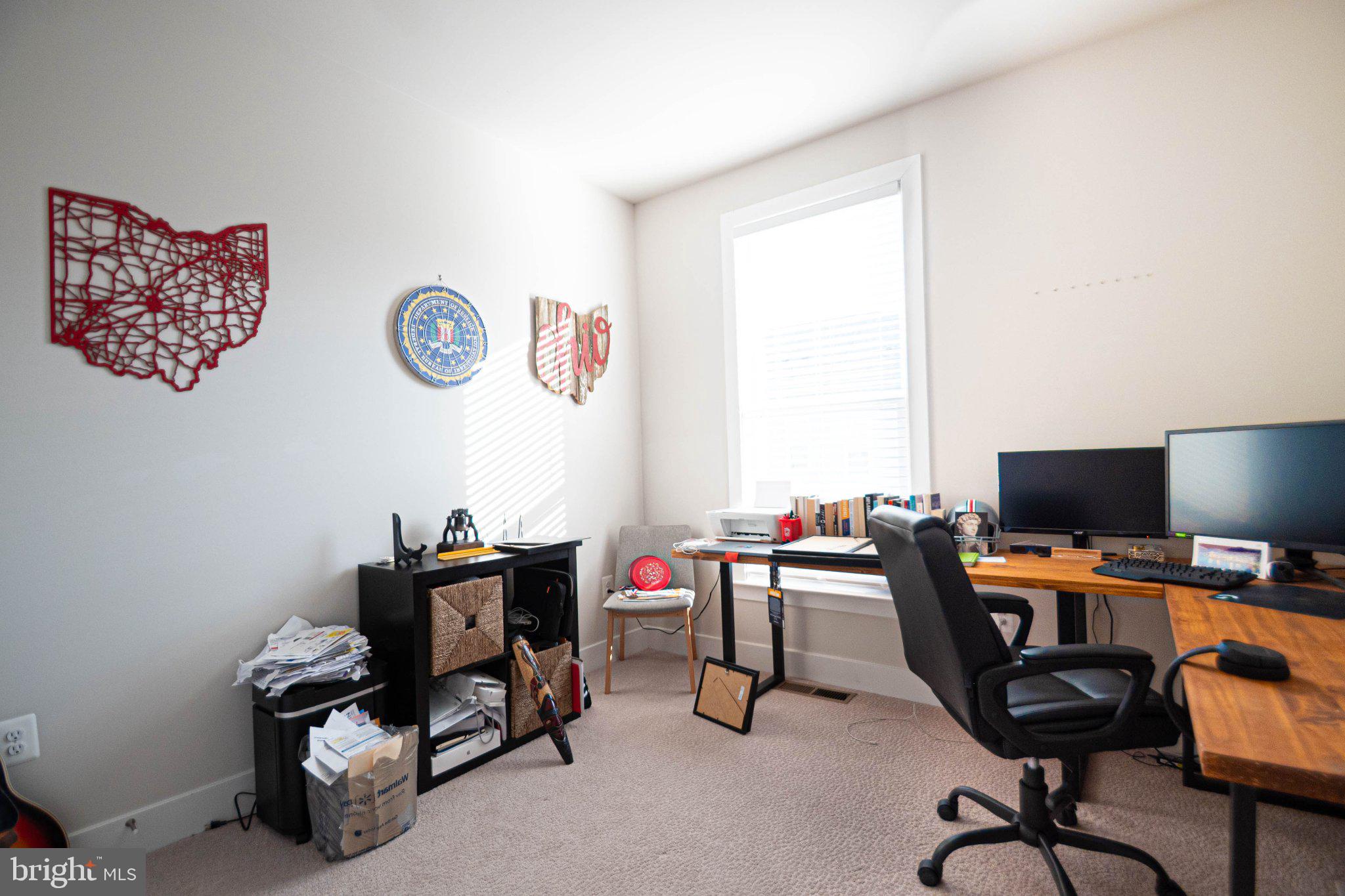 2453 Liberty Loop Herndon, VA 20171 - Photo 39 of 52 a view of a workspace with furniture and a window