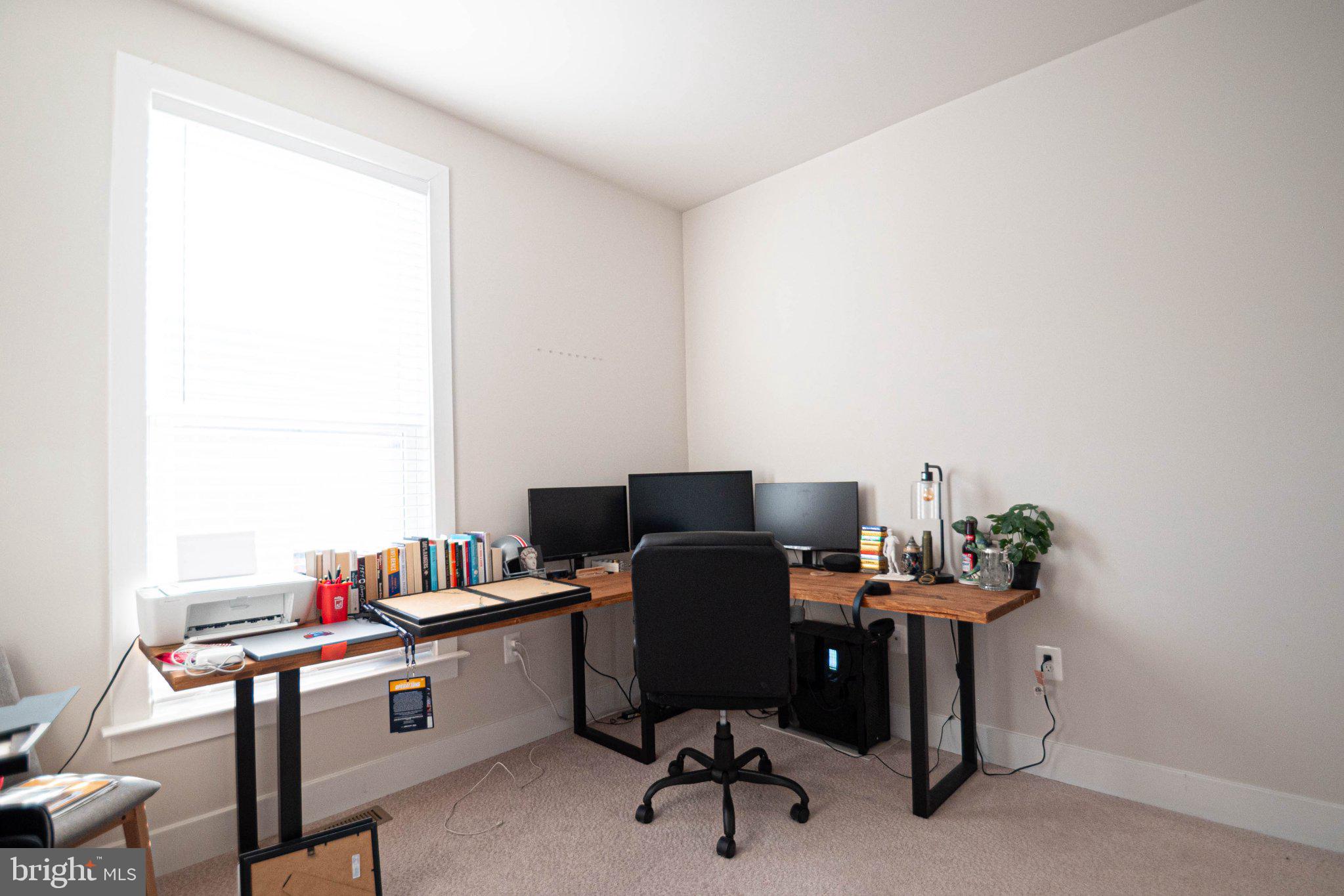 2453 Liberty Loop Herndon, VA 20171 - Photo 41 of 52 a view of a workspace with furniture