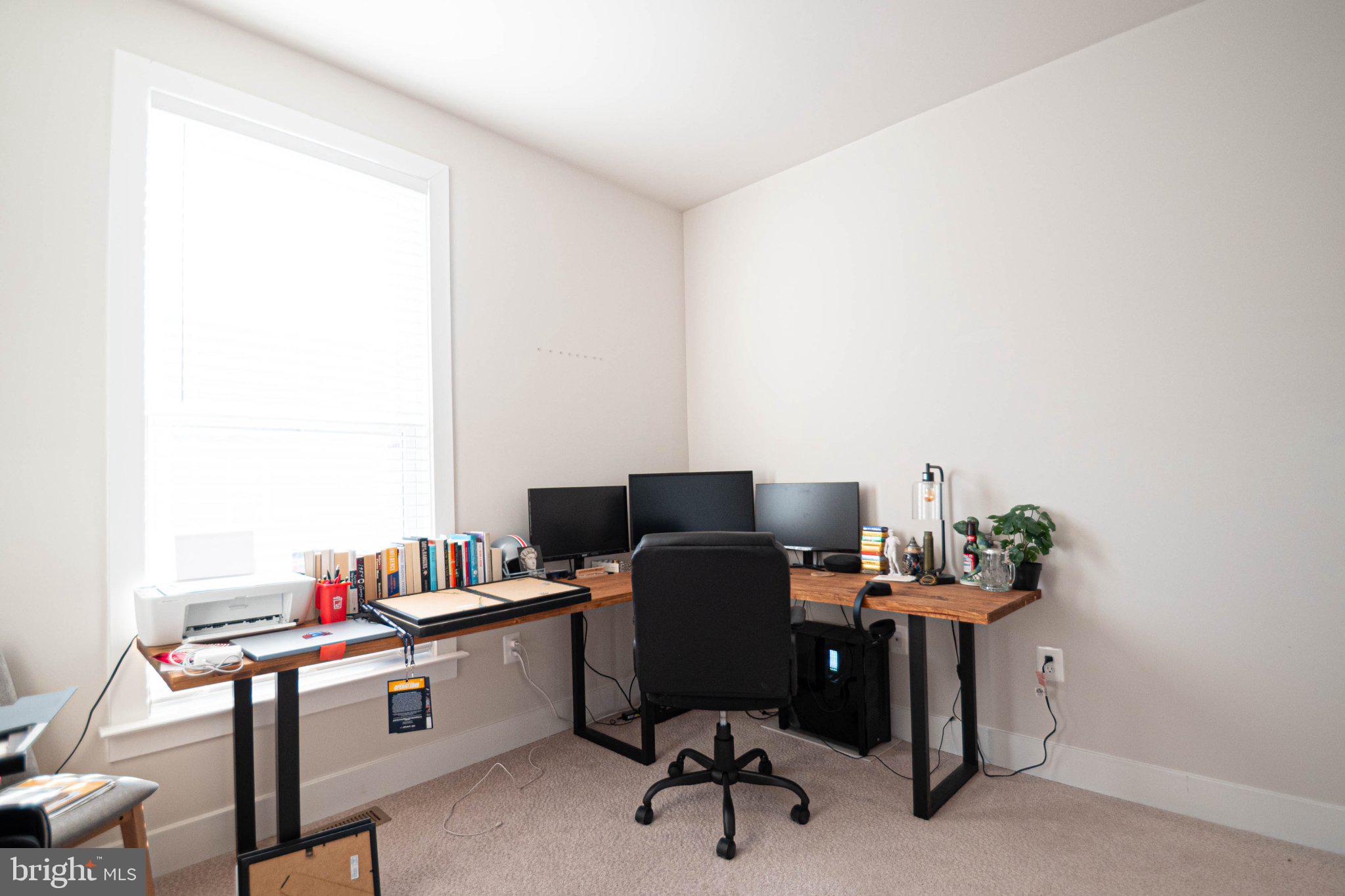 2453 Liberty Loop Herndon, VA 20171 - Photo 42 of 52 a view of a workspace with furniture