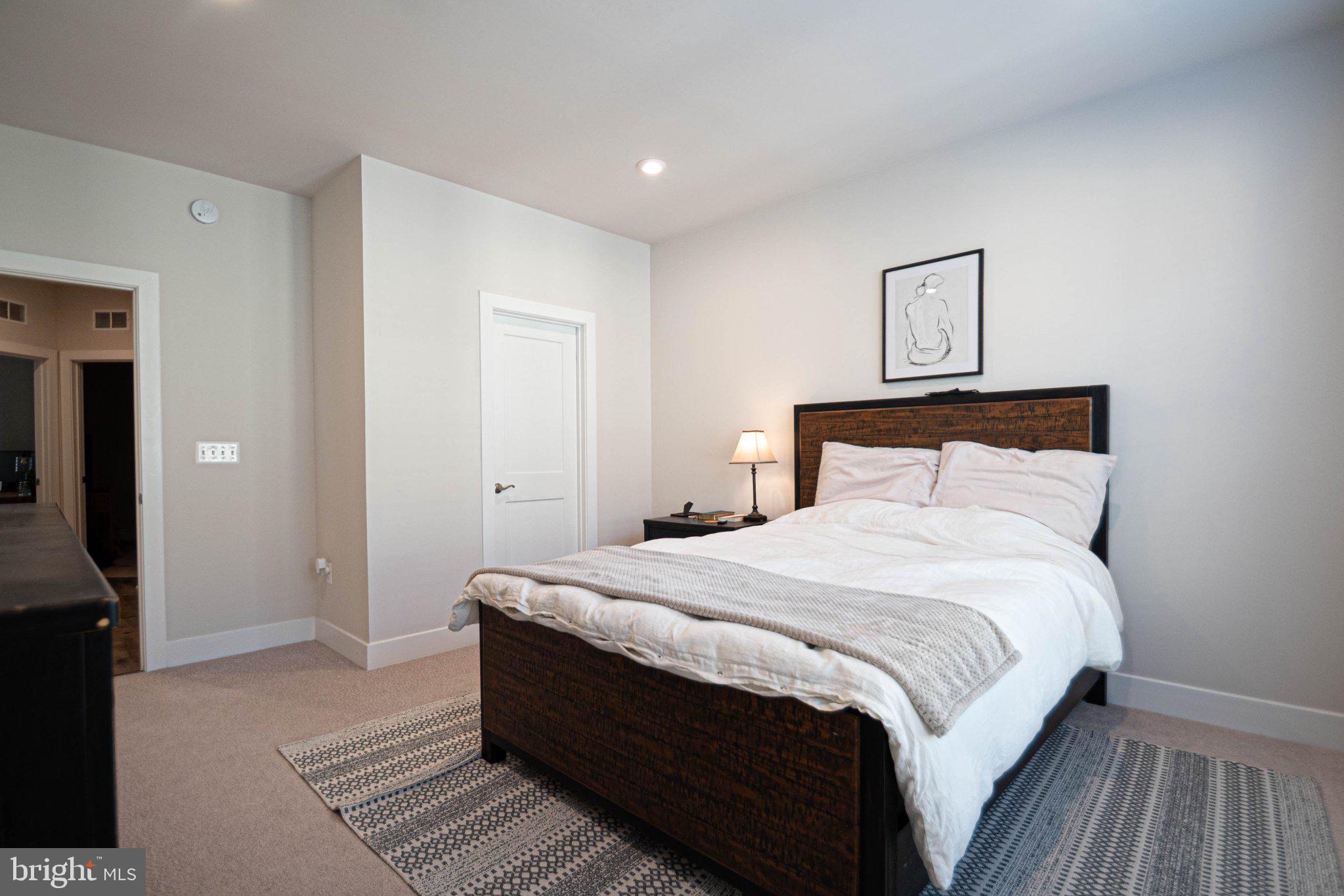 2453 Liberty Loop Herndon, VA 20171 - Photo 45 of 52 a bedroom with a bed and a view of bedroom