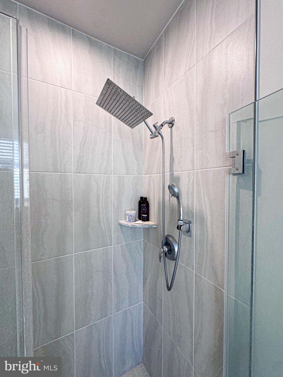 2453 Liberty Loop Herndon, VA 20171 - Photo 8 of 52 a bathroom with a shower
