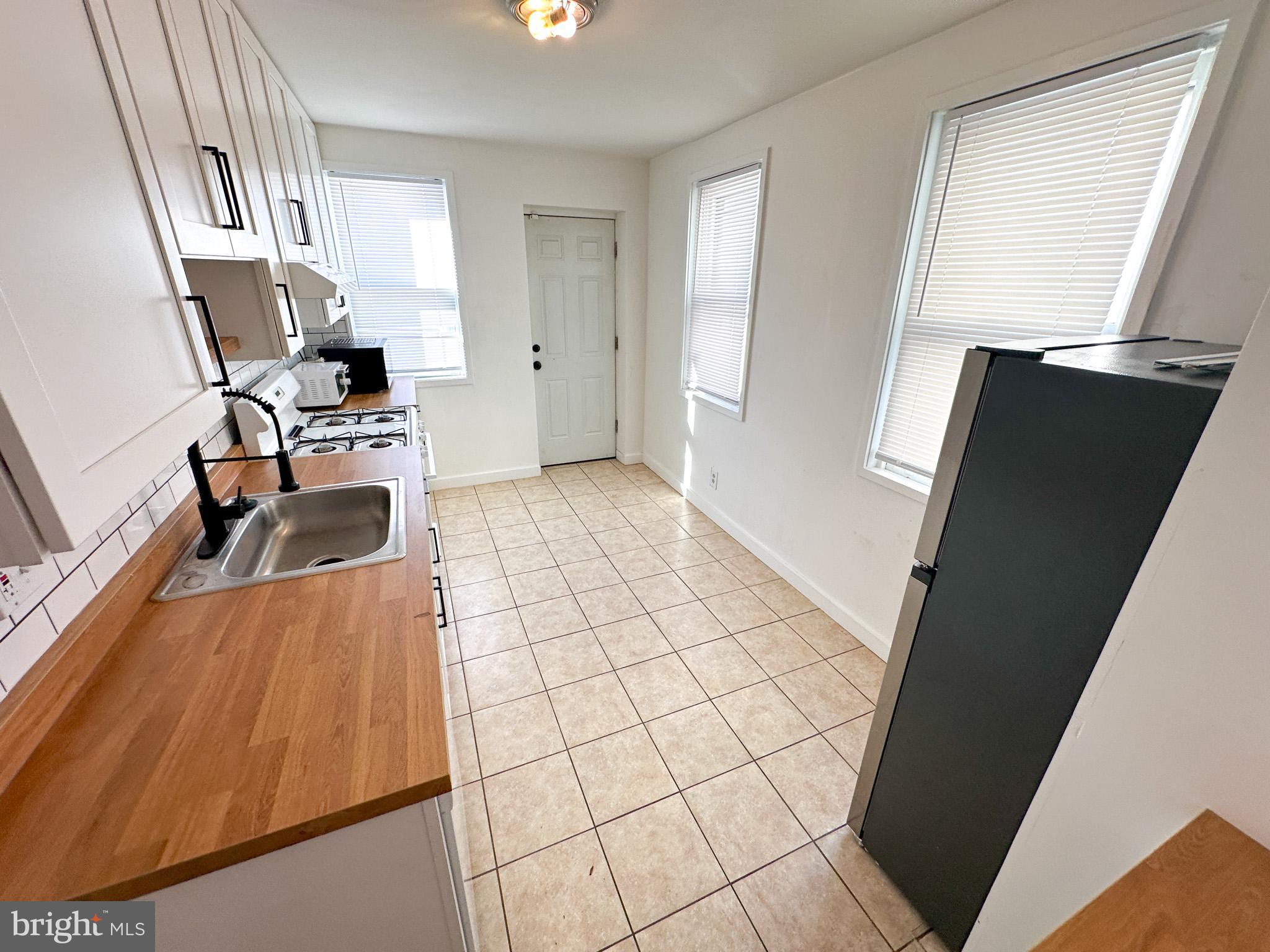 2834 East Venango Street Philadelphia, PA 19134 - Photo 3 of 14 a living room with furniture