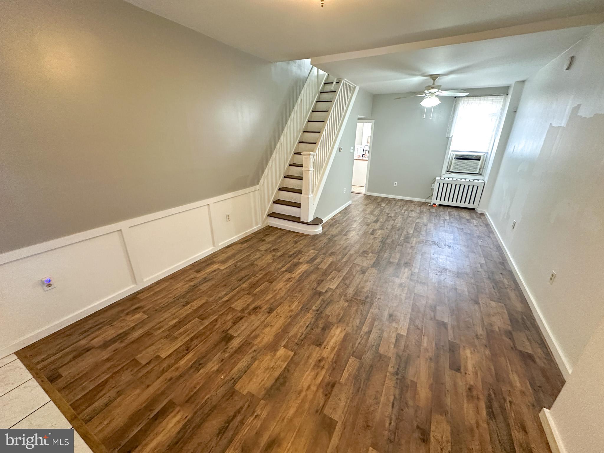 2834 East Venango Street Philadelphia, PA 19134 - Photo 5 of 14 wooden floor in an empty room