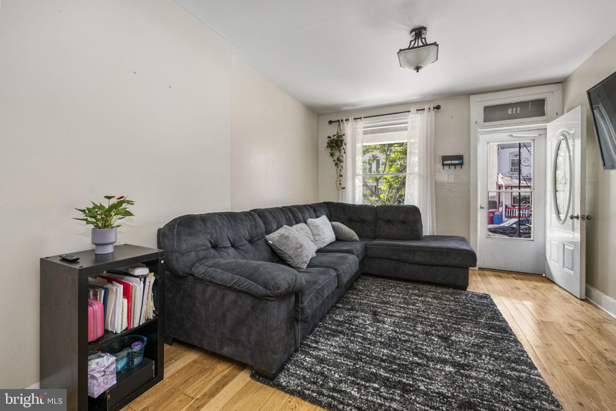 115 Park Avenue Reading, PA 19605 - Photo 5 of 28 a living room with furniture and a window