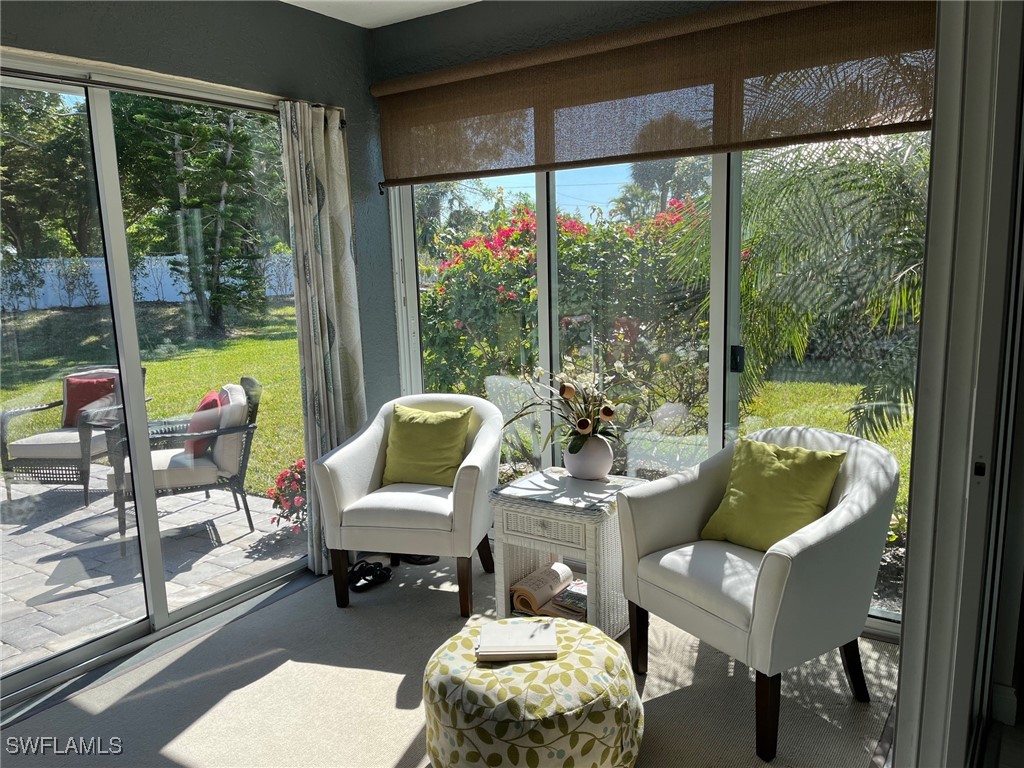 512 Islamorada Boulevard Punta Gorda, FL 33955 - Photo 16 of 46 a living room with furniture and a large window