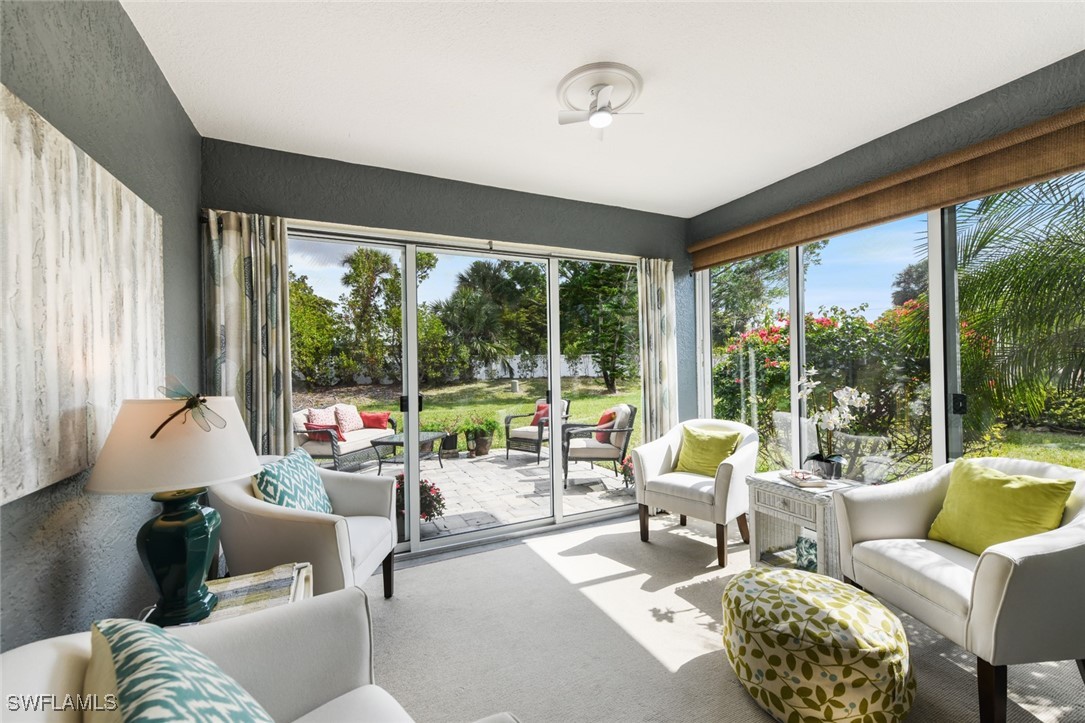 512 Islamorada Boulevard Punta Gorda, FL 33955 - Photo 17 of 46 a living room with furniture and a large window