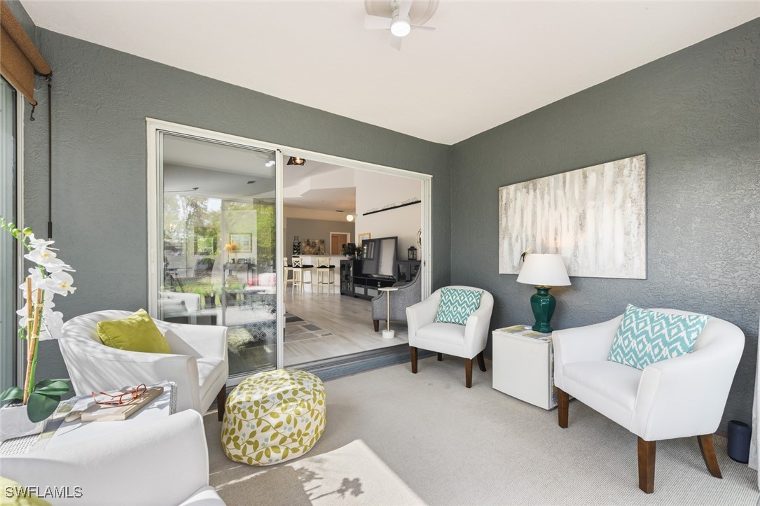 512 Islamorada Boulevard Punta Gorda, FL 33955 - Photo 19 of 46 a living room with furniture and a large window