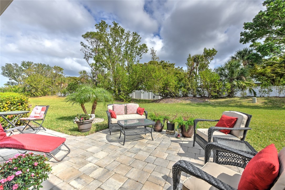 512 Islamorada Boulevard Punta Gorda, FL 33955 - Photo 2 of 46 a backyard of a house with outdoor seating