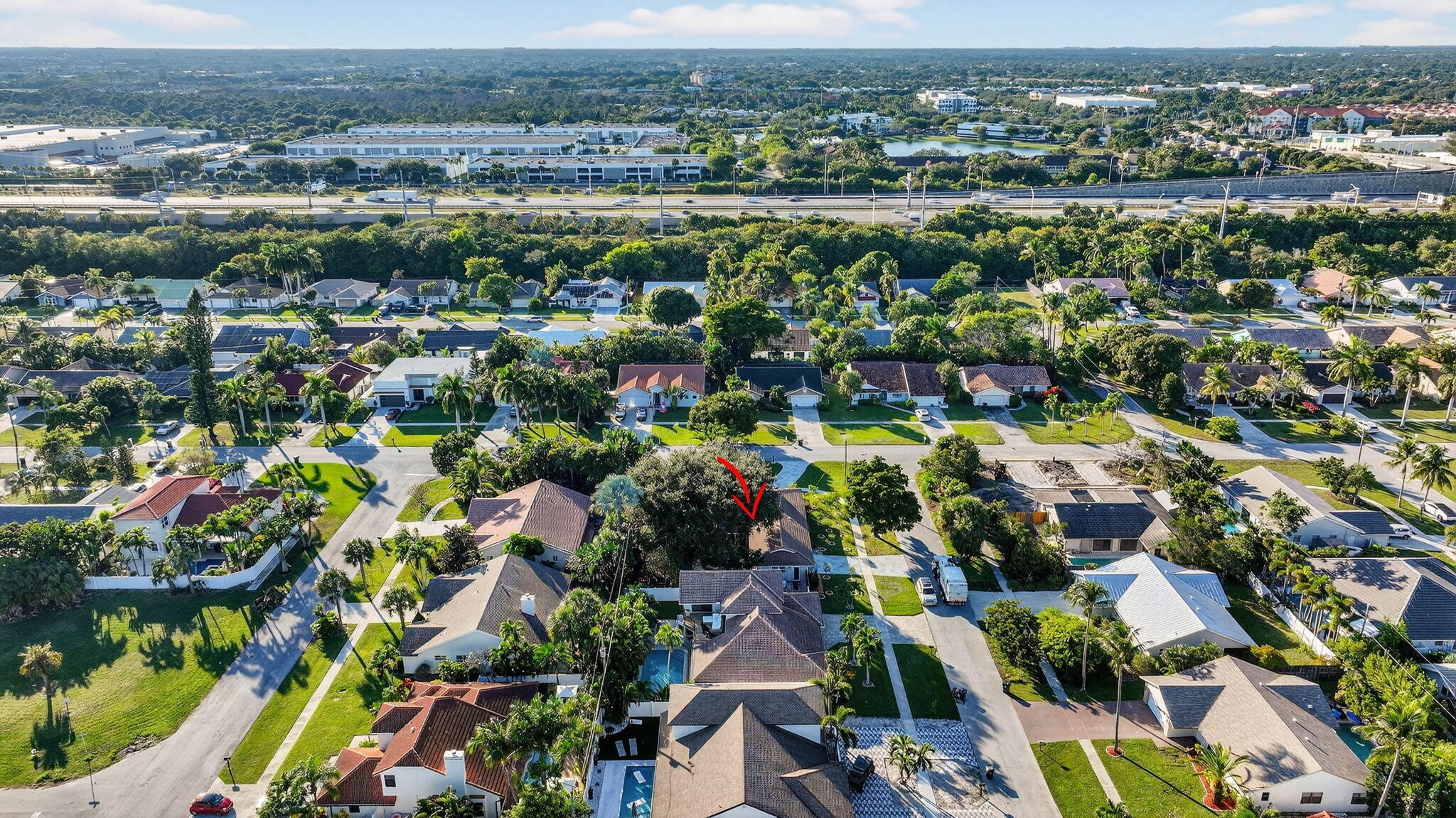 7598 West Country Club Boulevard Boca Raton, FL 33487 - Photo 101 of 103 an aerial view of residential houses with outdoor space and swimming pool