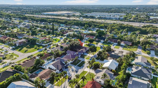 $1,095,000 | 7598 West Country Club Boulevard, Boca Raton, FL 33487