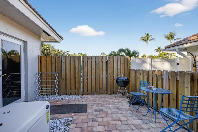 a bedroom with a bed and a table in it