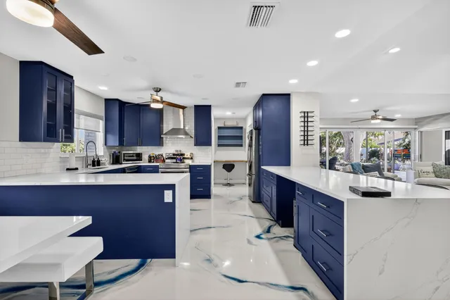 $1,095,000 | 7598 West Country Club Boulevard, Boca Raton, FL 33487