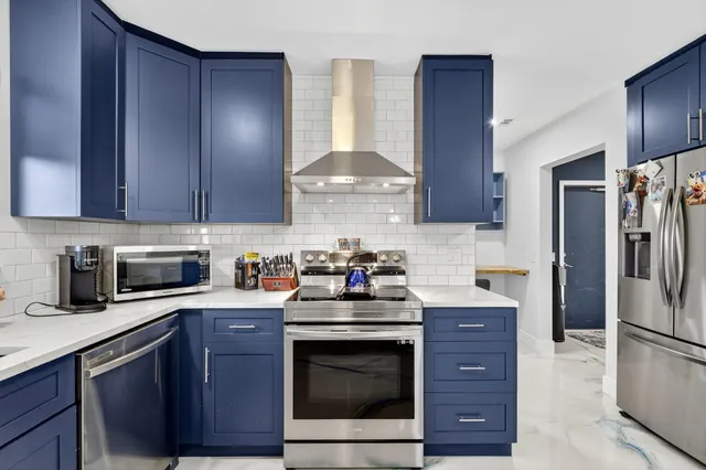 $1,095,000 | 7598 West Country Club Boulevard, Boca Raton, FL 33487