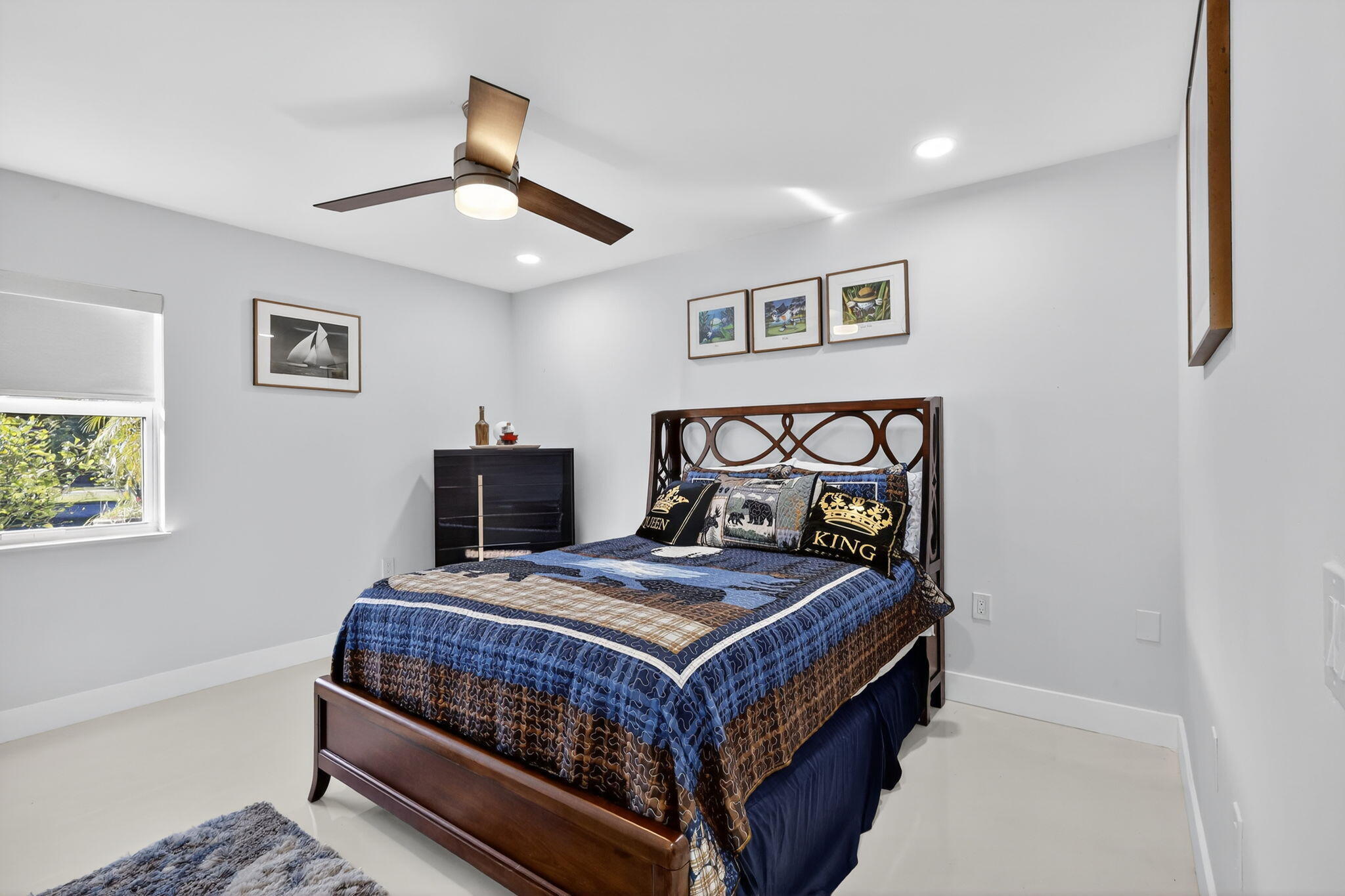 7598 West Country Club Boulevard Boca Raton, FL 33487 - Photo 80 of 103 a bedroom with a bed and a table in it