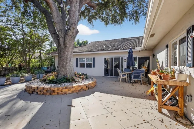 $1,095,000 | 7598 West Country Club Boulevard, Boca Raton, FL 33487