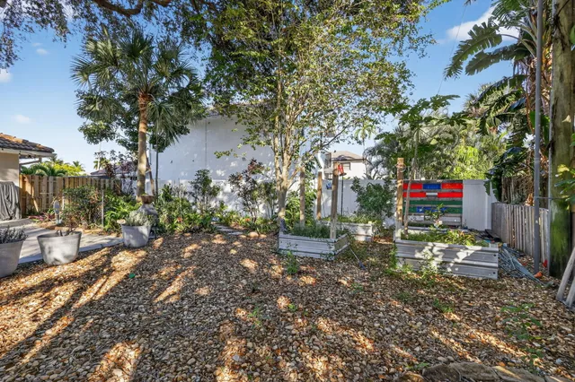 $1,095,000 | 7598 West Country Club Boulevard, Boca Raton, FL 33487