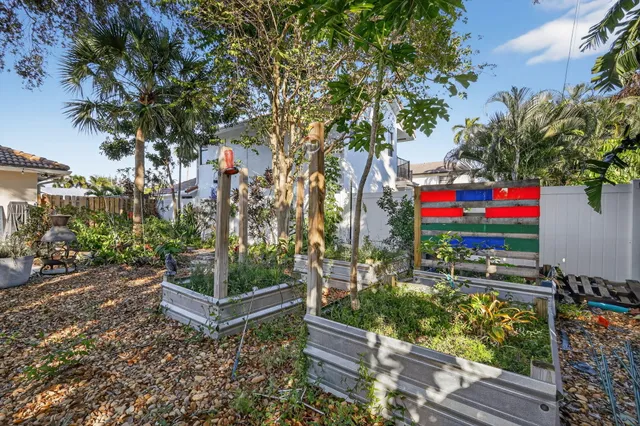 $1,095,000 | 7598 West Country Club Boulevard, Boca Raton, FL 33487