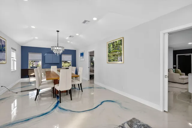 a front view of a house with entertaining space