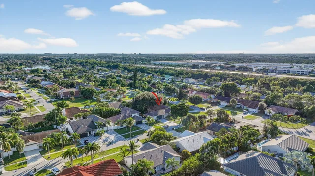 $1,095,000 | 7598 West Country Club Boulevard, Boca Raton, FL 33487