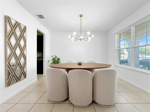 a view of kitchen with furniture and window