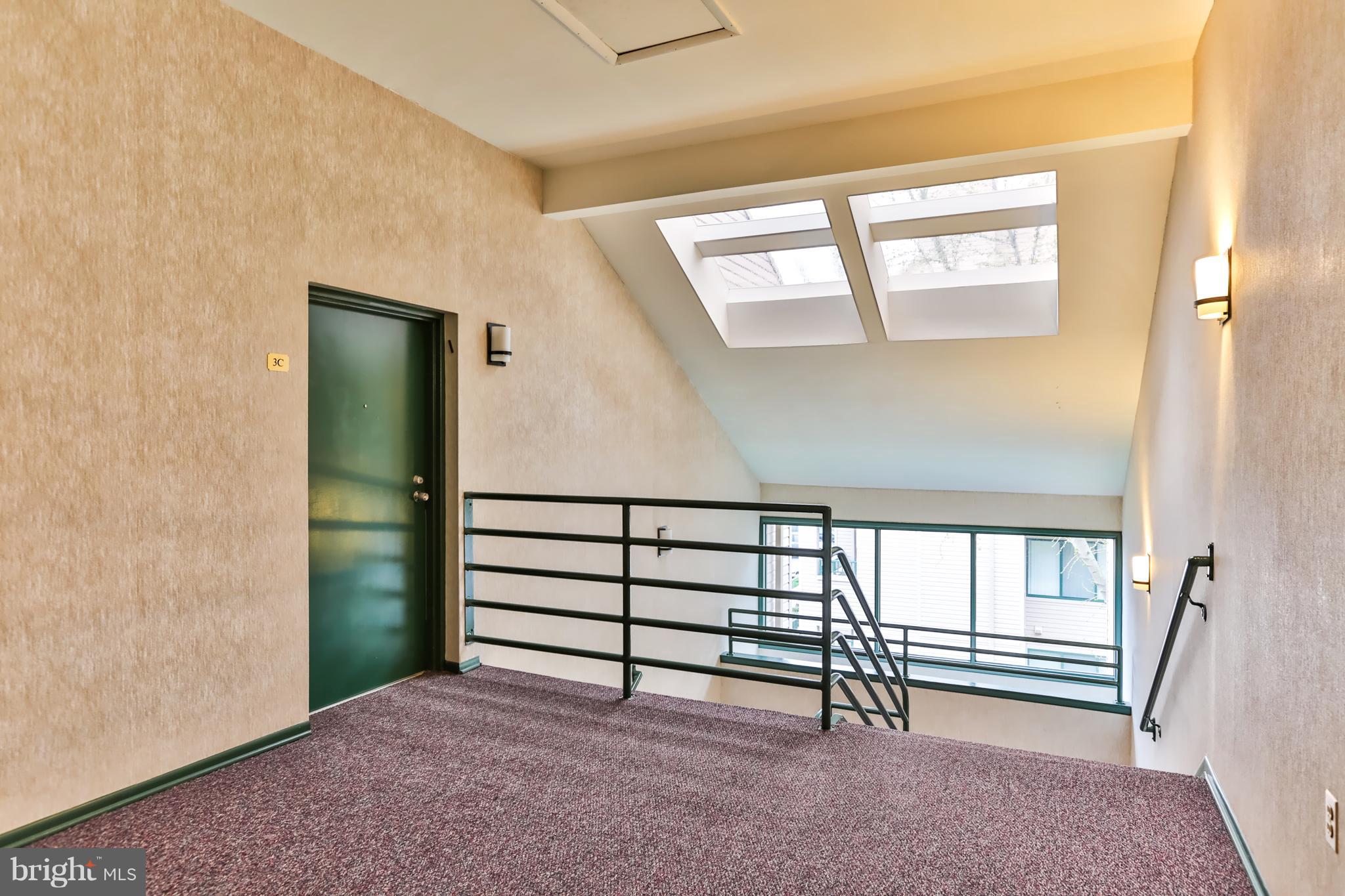 6 Winners Circle, Unit 3C Owings Mills, MD 21117 - Photo 2 of 26 a view of a livingroom with furniture and a window