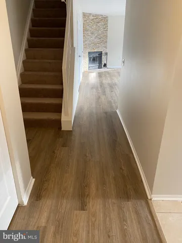 a view of entryway with wooden floor
