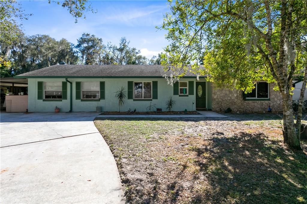Welcome to this spacious property located on 2.5 acres in DeLand!