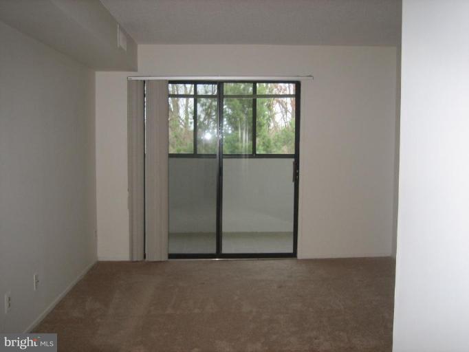 1951 Sagewood Lane, Unit 302 Reston, VA 20191 - Photo 9 of 23 Master Bedroom