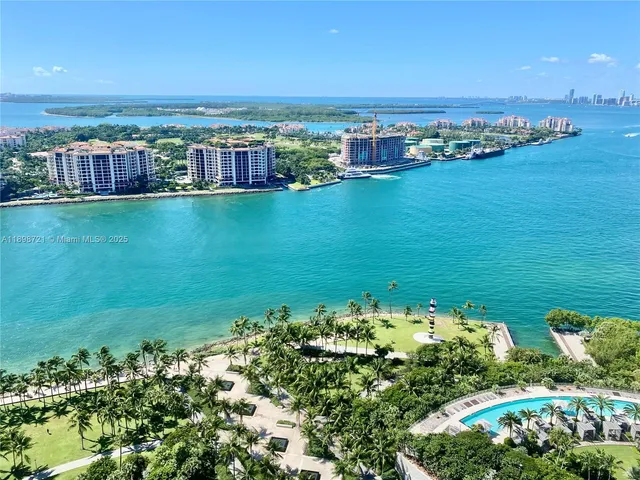a view of a city with a lake