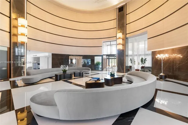 a view of a patio with furniture and a chandelier