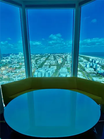 a view of swimming pool from a window